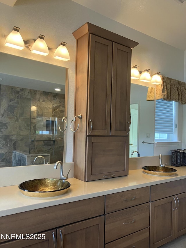 3678 Brighton Way, Reno, NV 89509 - bathroom featuring double vanity and a stall shower