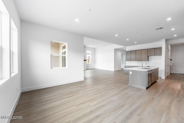 7511 Hoback Dr Unit Windsong 54, Sparks, NV 89436 - kitchen with recessed lighting, open floor plan, light wood-type flooring, and light countertops