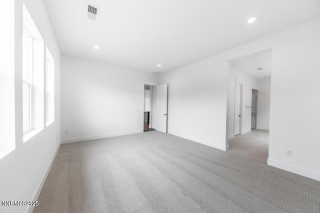 7511 Hoback Dr Unit Windsong 54, Sparks, NV 89436 - unfurnished room with light colored carpet and recessed lighting