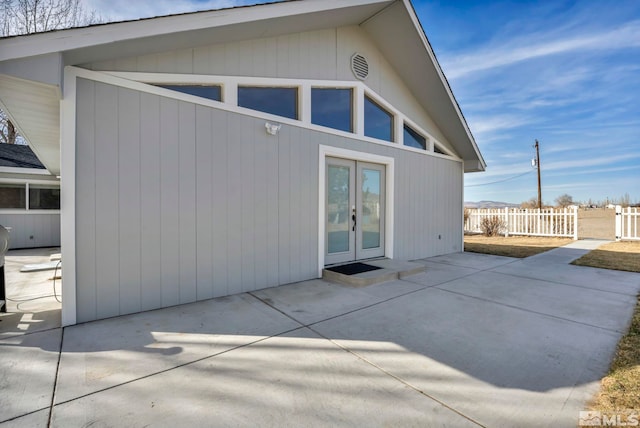 605 E US Highway 95a, Yerington, NV 89447 - back of house featuring french doors, a patio, and fence