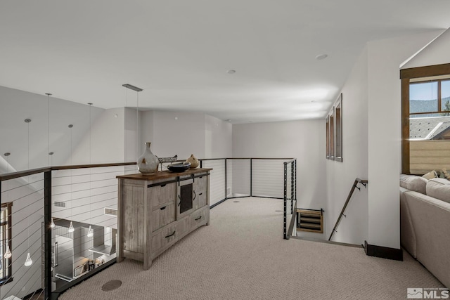 28 Beach Club Dr Unit 407, Stateline, NV 89449 - corridor with an upstairs landing, light carpet, and baseboards