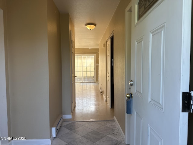 474 Smithridge Pkwy, Reno, NV 89502 - hall with a baseboard radiator, baseboards, and light marble finish floors
