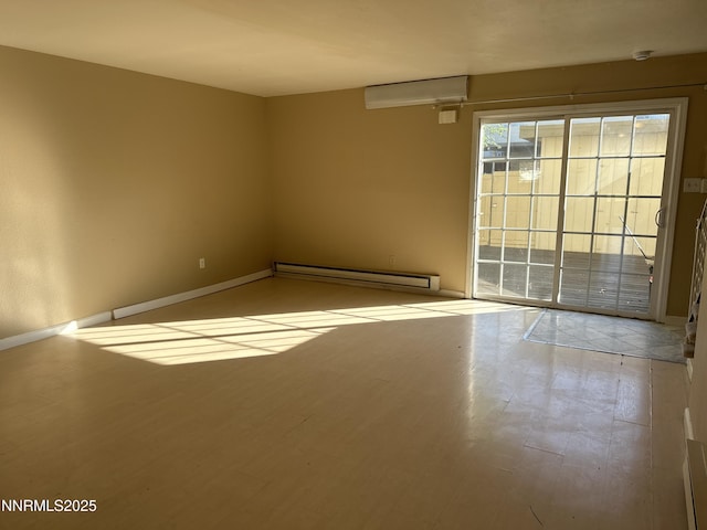 474 Smithridge Pkwy, Reno, NV 89502 - unfurnished room featuring a baseboard heating unit, wood finished floors, and baseboards