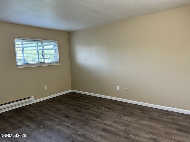 474 Smithridge Pkwy, Reno, NV 89502 - empty room featuring dark wood-style floors, baseboards, and a baseboard heating unit