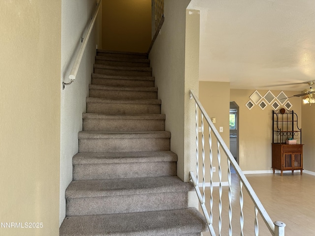 474 Smithridge Pkwy, Reno, NV 89502 - stairway featuring ceiling fan and baseboards
