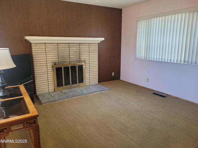 421 Glenmanor Dr, Reno, NV 89509 - unfurnished living room featuring a fireplace and carpet