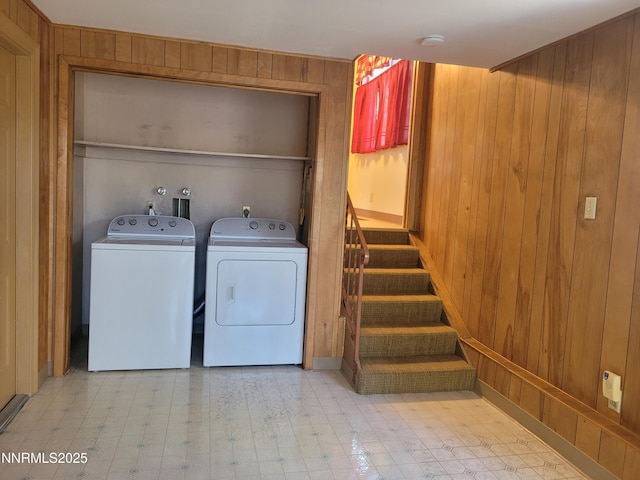 421 Glenmanor Dr, Reno, NV 89509 - laundry room featuring washing machine and clothes dryer, wood walls, and tile patterned floors