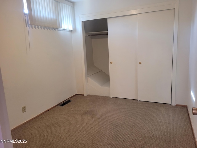 421 Glenmanor Dr, Reno, NV 89509 - unfurnished bedroom with carpet floors and a closet