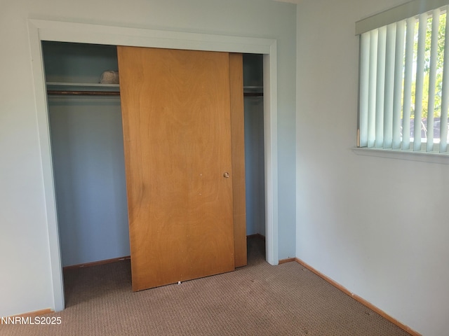 421 Glenmanor Dr, Reno, NV 89509 - unfurnished bedroom with a closet, carpet flooring, and baseboards