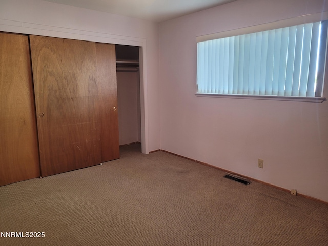 421 Glenmanor Dr, Reno, NV 89509 - unfurnished bedroom featuring carpet flooring, a closet, and baseboards