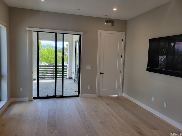 62 Caballada St, Reno, NV 89511 - spare room with light wood finished floors, baseboards, and recessed lighting