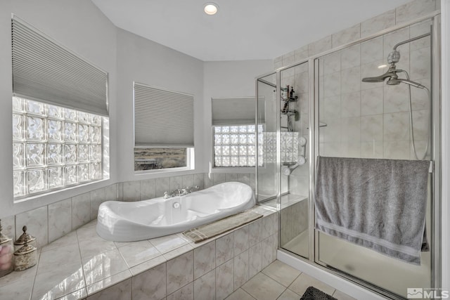 5650 S Allen Rd, Fallon, NV 89406 - bathroom featuring plenty of natural light, a stall shower, a bath, and tile patterned floors