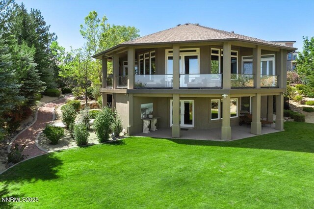 3035 Palmer Pointe Ct, Reno, NV 89511 - back of property with stucco siding, a balcony, a yard, and a patio