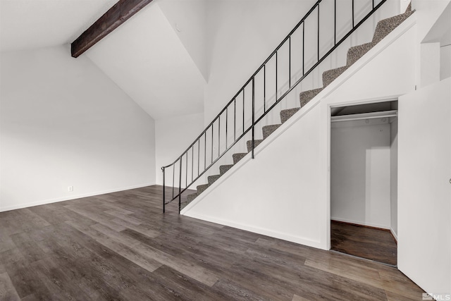 2267 Rock Blvd, Sparks, NV 89431 - staircase with beamed ceiling, wood finished floors, high vaulted ceiling, and baseboards