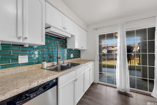 2267 Rock Blvd, Sparks, NV 89431 - kitchen featuring dishwasher, a sink, light countertops, and white cabinetry