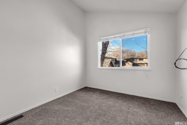 2267 Rock Blvd, Sparks, NV 89431 - carpeted spare room with lofted ceiling and baseboards