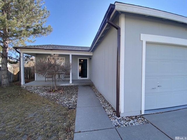 9770 Brightridge, Reno, NV 89506 - entrance to property featuring a porch, a garage, and fence