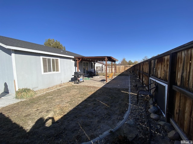 9770 Brightridge, Reno, NV 89506 - fenced backyard with a patio area