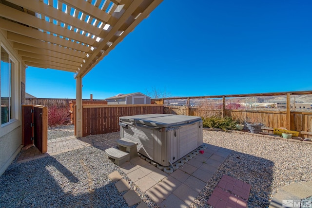 11725 Paradise View Dr, Sparks, NV 89441 - fenced backyard with a hot tub, a patio, and a pergola