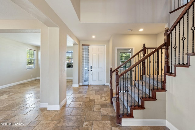 8389 Opal Ranch Way, Reno, NV 89506 - entryway featuring stone tile floors, stairs, recessed lighting, and baseboards