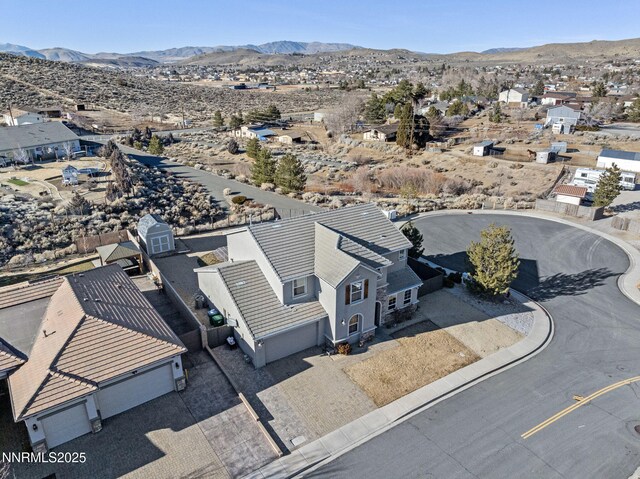 8389 Opal Ranch Way, Reno, NV 89506 - aerial perspective of suburban area with a mountainous background