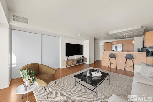 255 N Sierra St Unit 606, Reno, NV 89501 - living room featuring wood finished floors