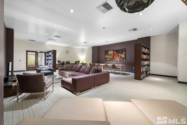 255 N Sierra St Unit 606, Reno, NV 89501 - carpeted living room with recessed lighting and baseboards