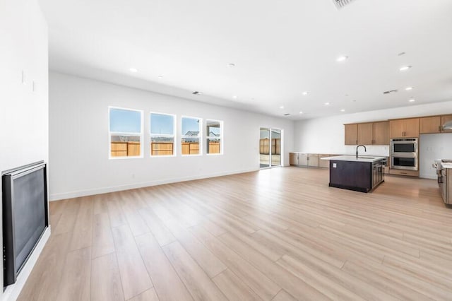 401 Pah Rah Ridge Dr Unit Harris 35, Sparks, NV 89441 - living room featuring recessed lighting, light wood finished floors, and baseboards