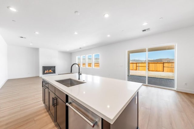 401 Pah Rah Ridge Dr Unit Harris 35, Sparks, NV 89441 - kitchen with a sink, stainless steel dishwasher, light wood finished floors, recessed lighting, and open floor plan