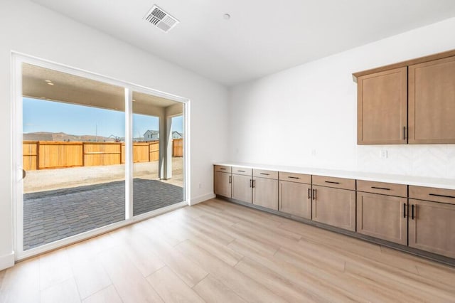 401 Pah Rah Ridge Dr Unit Harris 35, Sparks, NV 89441 - unfurnished dining area with light wood-style flooring and baseboards