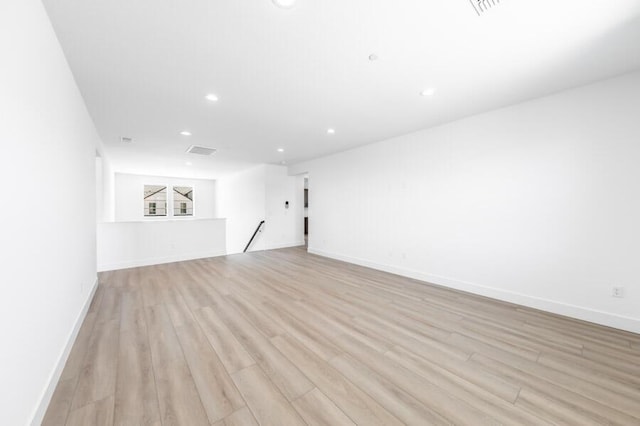 401 Pah Rah Ridge Dr Unit Harris 35, Sparks, NV 89441 - unfurnished living room featuring light wood-style flooring, recessed lighting, and baseboards