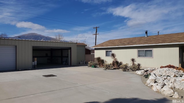 223 I St, Hawthorne, NV 89415 - view of home's exterior featuring an outbuilding and a garage