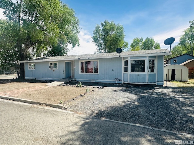 815 16th St, Lovelock, NV 89419 - view of front of property with a shed and an outdoor structure