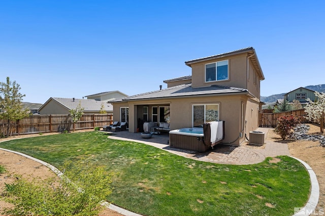 rear view of house featuring an outdoor living space, a patio, stucco siding, and a tile roof