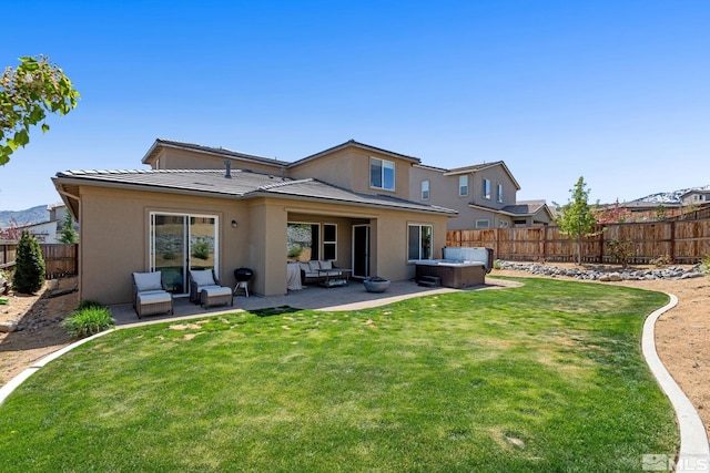 rear view of property with an outdoor hangout area, stucco siding, a patio area, and a tile roof