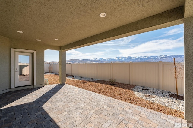 11223 Freedom Range Ln, Reno, NV 89521 - view of patio / terrace featuring a fenced backyard and a mountain view
