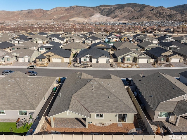 11223 Freedom Range Ln, Reno, NV 89521 - aerial view of residential area with a mountainous background