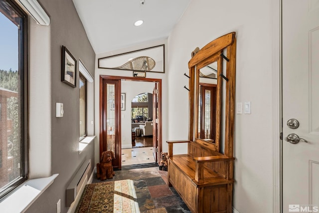 400 Fairview Blvd Unit 155, Incline Village, NV 89451 - doorway to outside with stone tile floors, baseboard heating, vaulted ceiling, baseboards, and recessed lighting