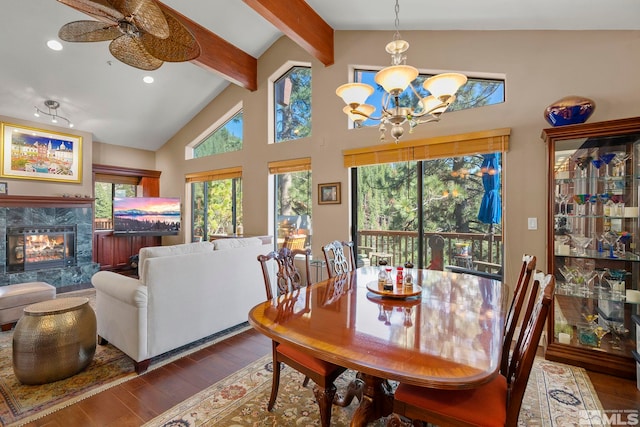 400 Fairview Blvd Unit 155, Incline Village, NV 89451 - dining room featuring hardwood / wood-style flooring, beam ceiling, a chandelier, a premium fireplace, and recessed lighting