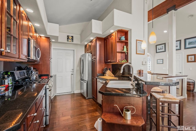 400 Fairview Blvd Unit 155, Incline Village, NV 89451 - kitchen featuring stainless steel appliances, a sink, a breakfast bar, dark wood-style flooring, and open shelves