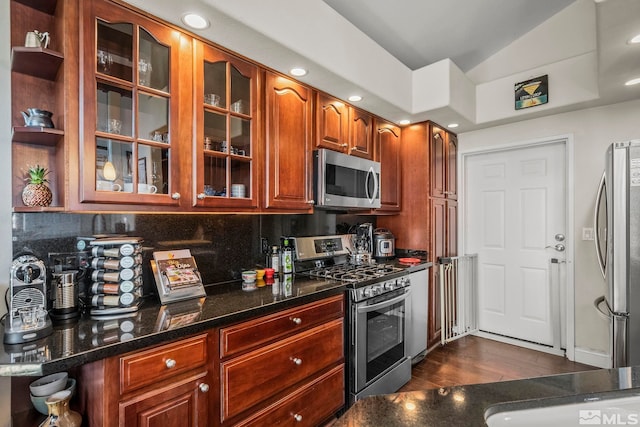 400 Fairview Blvd Unit 155, Incline Village, NV 89451 - kitchen with appliances with stainless steel finishes, backsplash, glass insert cabinets, open shelves, and vaulted ceiling