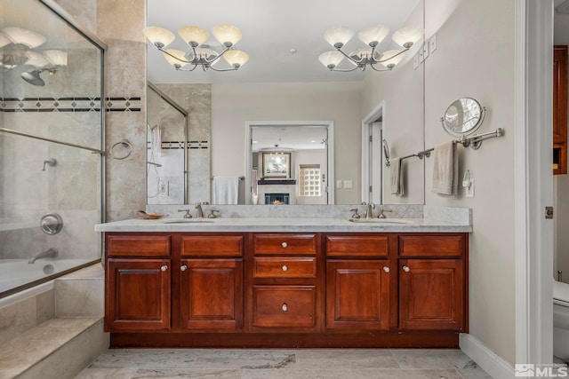 400 Fairview Blvd Unit 155, Incline Village, NV 89451 - full bathroom featuring a chandelier, toilet, tiled shower / bath, and double vanity