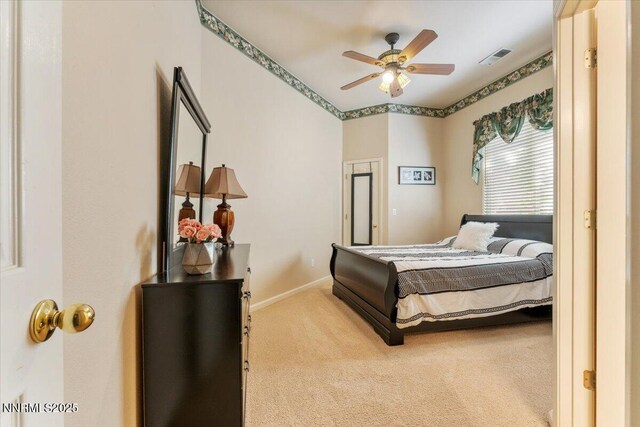 1556 Diamond Country Dr, Reno, NV 89521 - carpeted bedroom with baseboards and a ceiling fan