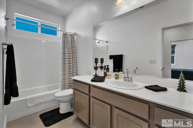 3631 Pulsar Ln Unit 1, Carson City, NV 89705 - bathroom with toilet, vanity, tile patterned flooring, and shower / bath combo with shower curtain