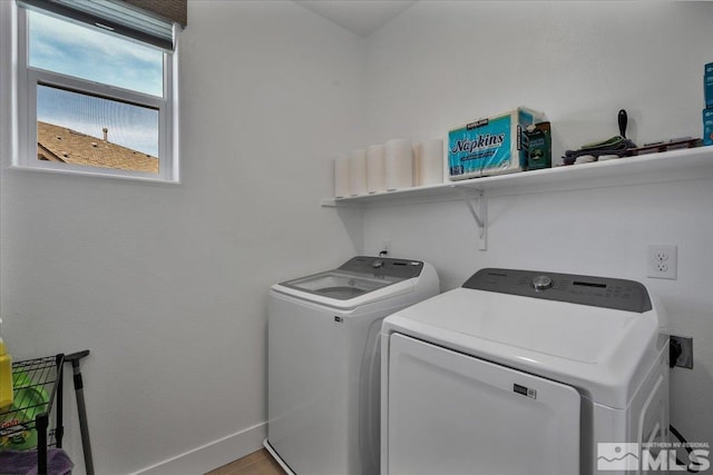 3631 Pulsar Ln Unit 1, Carson City, NV 89705 - washroom with washing machine and dryer and baseboards