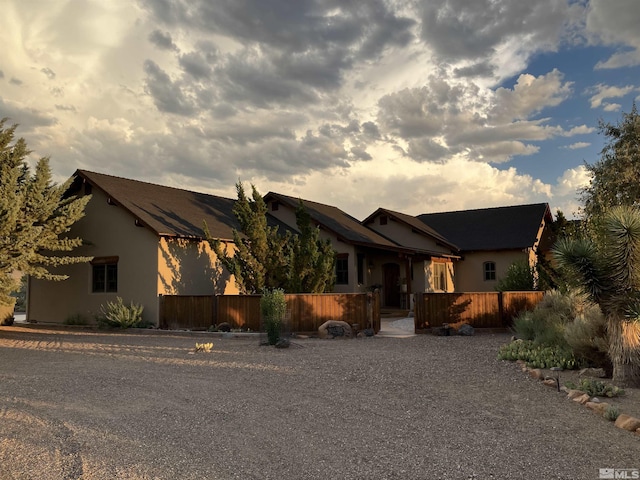 10 Dee Ct, Smith, NV 89430 - view of front of property featuring a fenced front yard and stucco siding