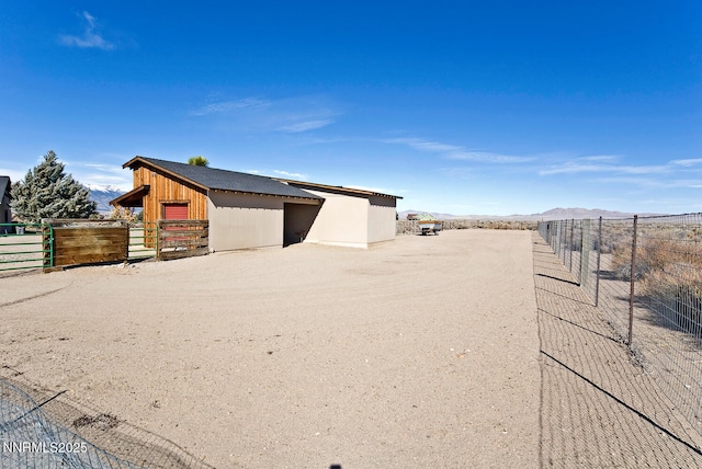 10 Dee Ct, Smith Valley, NV 89444 - view of outdoor structure with a mountain view and an exterior structure