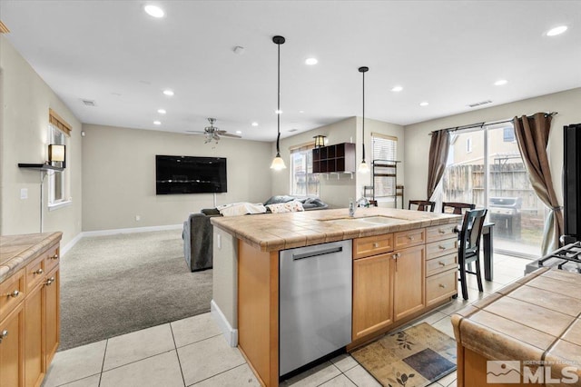 1950 Red Willow Dr, Reno, NV 89521 - kitchen featuring dishwasher, recessed lighting, open floor plan, a sink, and light colored carpet