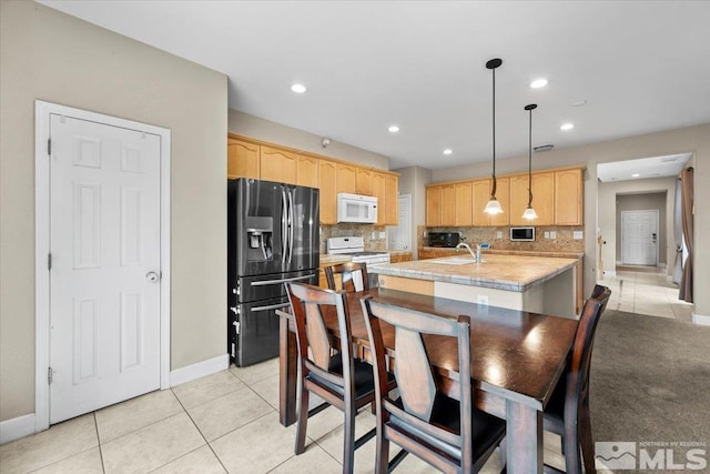 1950 Red Willow Dr, Reno, NV 89521 - dining space with baseboards, light tile patterned flooring, and recessed lighting