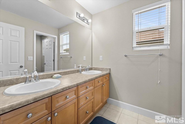 1950 Red Willow Dr, Reno, NV 89521 - full bathroom featuring tile patterned flooring, baseboards, and double vanity